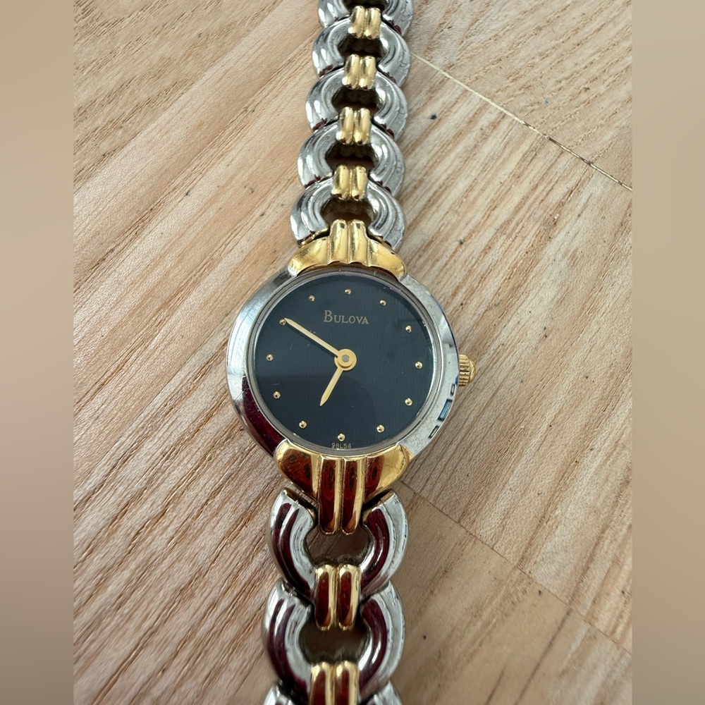 Bulova ladies black dial two toned dress watch NEW BATTERY